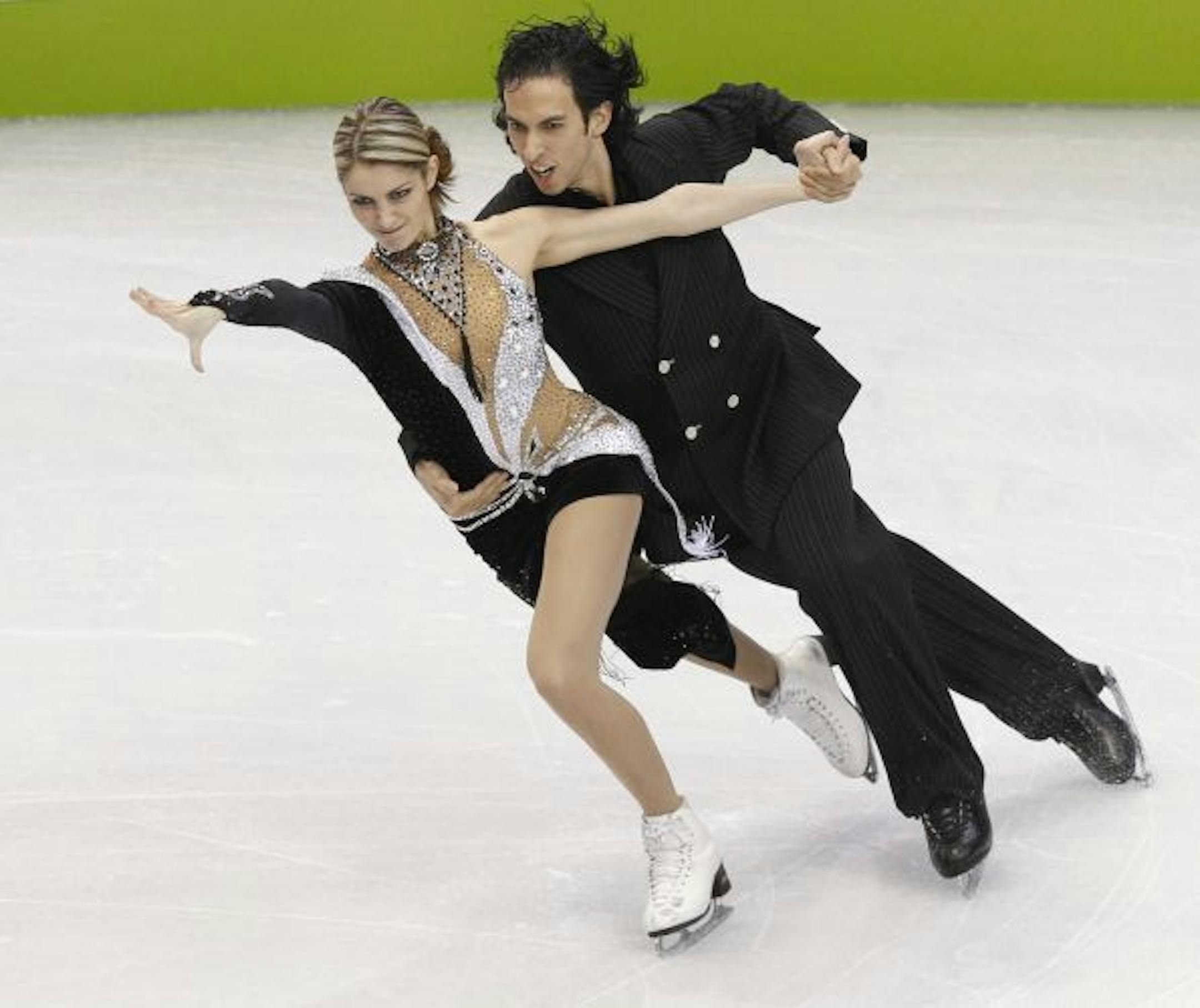 American skaters Tanith Belbin and Benjamin Agosto perform in the Compulsory Ice Dance competition during the 2010 Winter Olympics at the Pacific Coliseum in Vancouver, British Columbia, Canada, Friday, February 19, 2010.