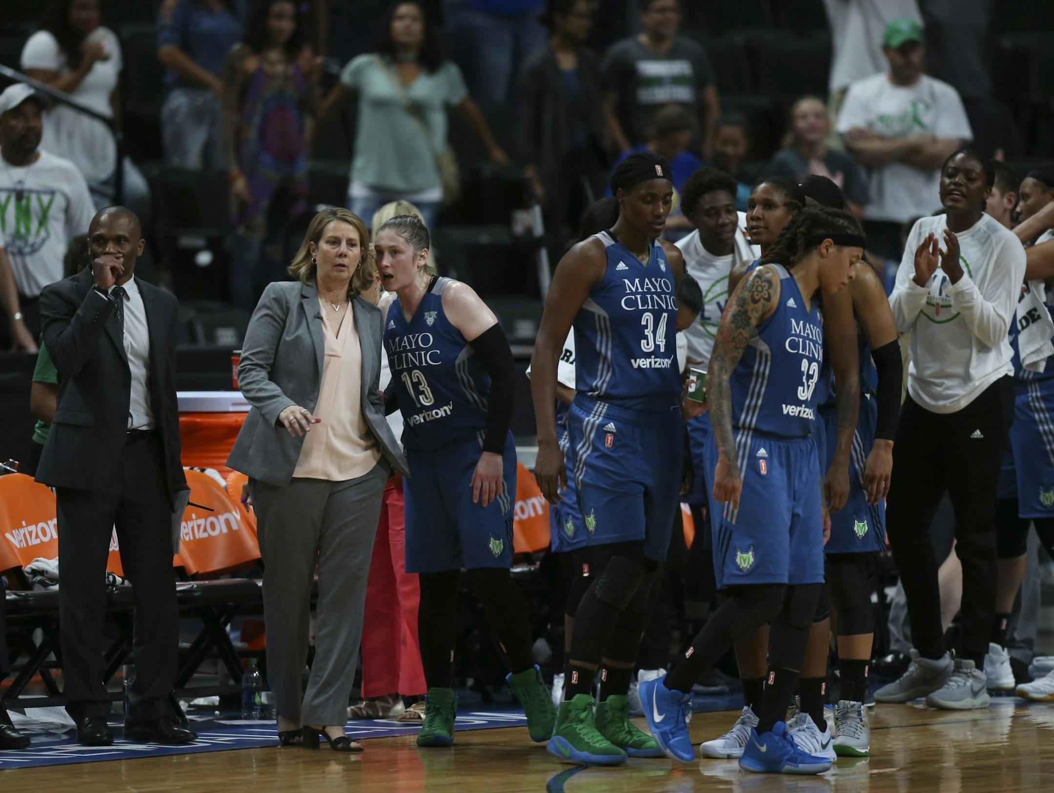 Minnesota Lynx guard Lindsay Whalen (13) and Lynx head coach Cheryl Reeve spoke after a late fourth quarter time out with the Lynx up by one point.