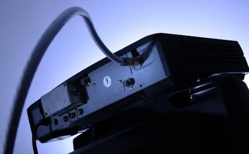 FILE - This Wednesday, May 30, 2007, file photo shows a cable box on top of a television in Philadelphia. Cable boxes may not be very exciting, but they&#xed;re emerging as a new battleground over the future of TV. Technology companies and the government want to open up the boxes to new services and programming. Cable companies want to keep control in their own hands. The outcome could affect what you pay for television and whether you&#xed;ll still need to clutter your entertainment center with