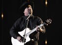 Garth Brooks performs "Stronger Than Me" at the 52nd annual CMA Awards at Bridgestone Arena on Wednesday, Nov. 14, 2018, in Nashville, Tenn. (Photo by