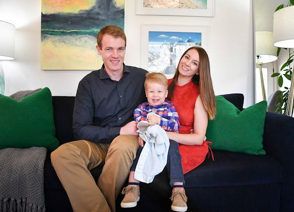 E.J. and Lyndsie Adams, with son Archer, bought and remodeled a 1960s side-by-side duplex near Excelsior.