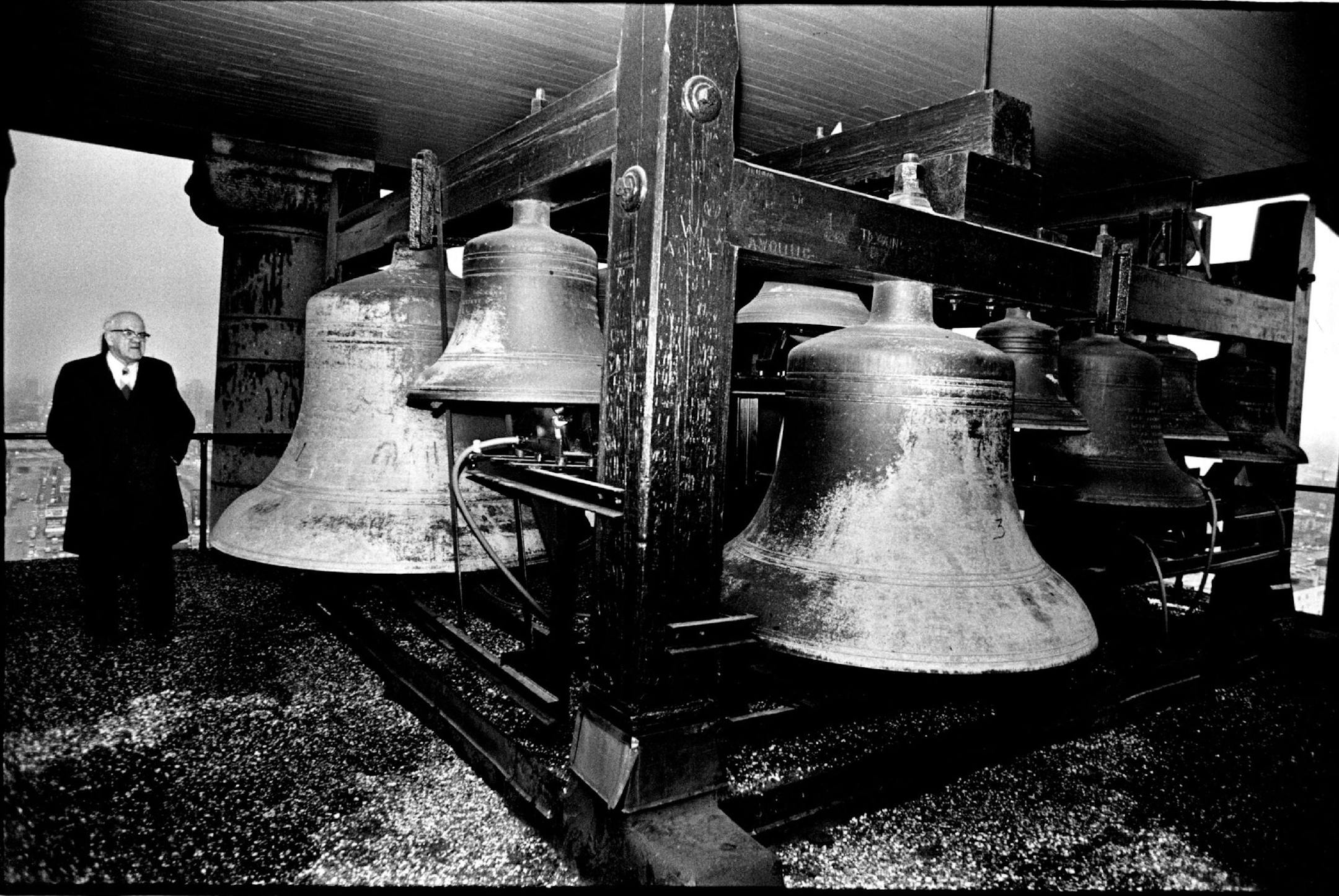 November 28, 1974 Ringing the Minneapolis City Hall bells on holidays has changed since the early 1900s when J. H. Auld climbed the 242 steps of the unheated bell tower to play by candlelight. The same bells will be ringing in Thanksgiving today, but they're no longer activated by pushing the oak hand and foot levers. The late Mr. Auld's son will be playing them by lightly touching the keys on a small electronic. November 27, 1974 Mike Zerby, Minneapolis Star Tribune