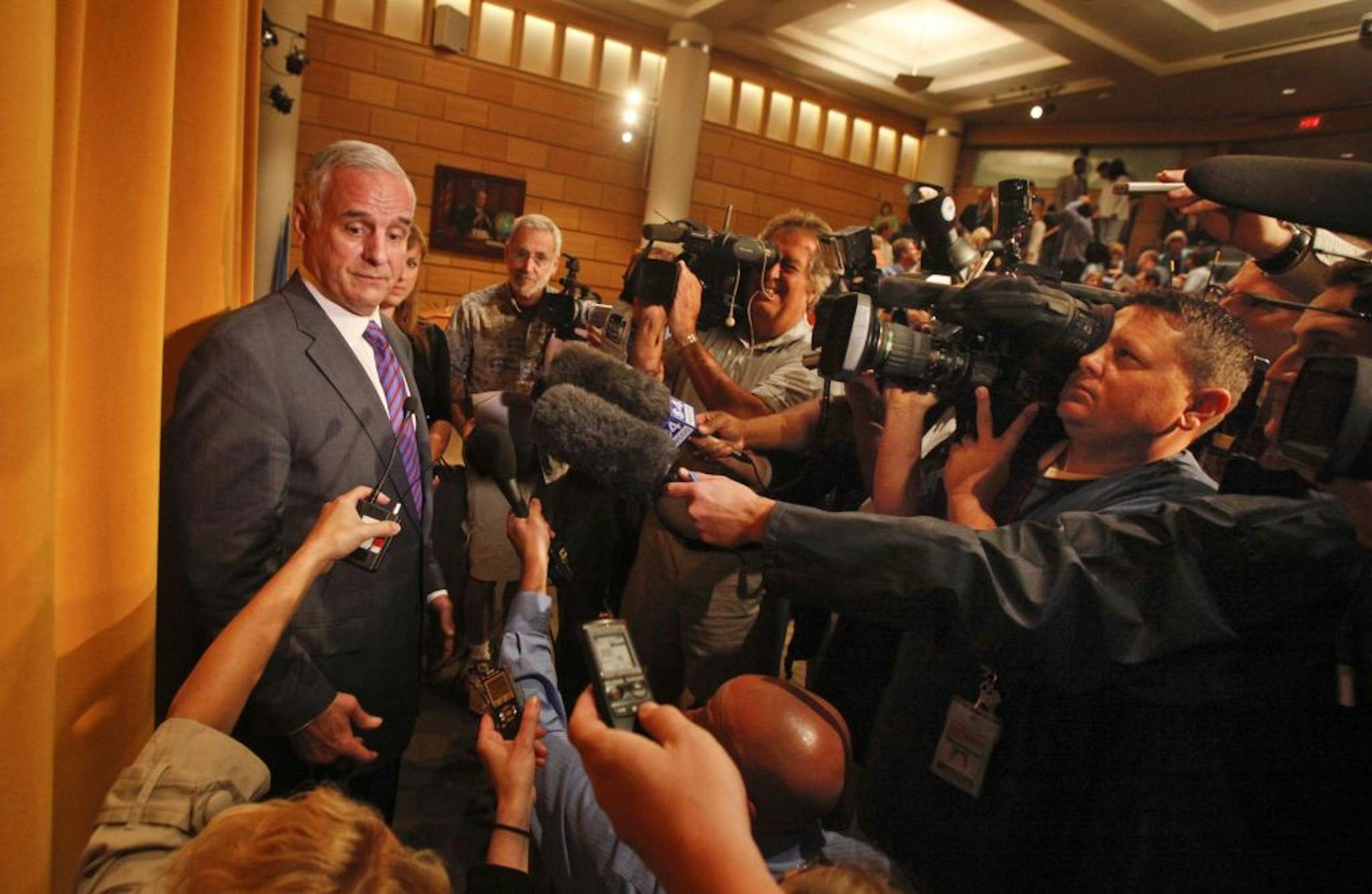 Gov. Mark Dayton met the media at the University of Minnesota's Hubert H. Humphrey School after announcing he would seek a budget deal with GOP leaders, Thursday, July 14, 2011, following a talk.