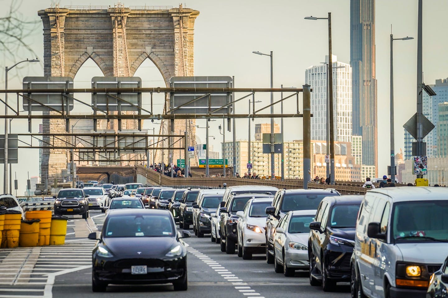 FILE - Traffic enters lower Manhattan after crossing the Brooklyn Bridge, Feb. 8, 2024, in New York. The Biden administration this week is expected to