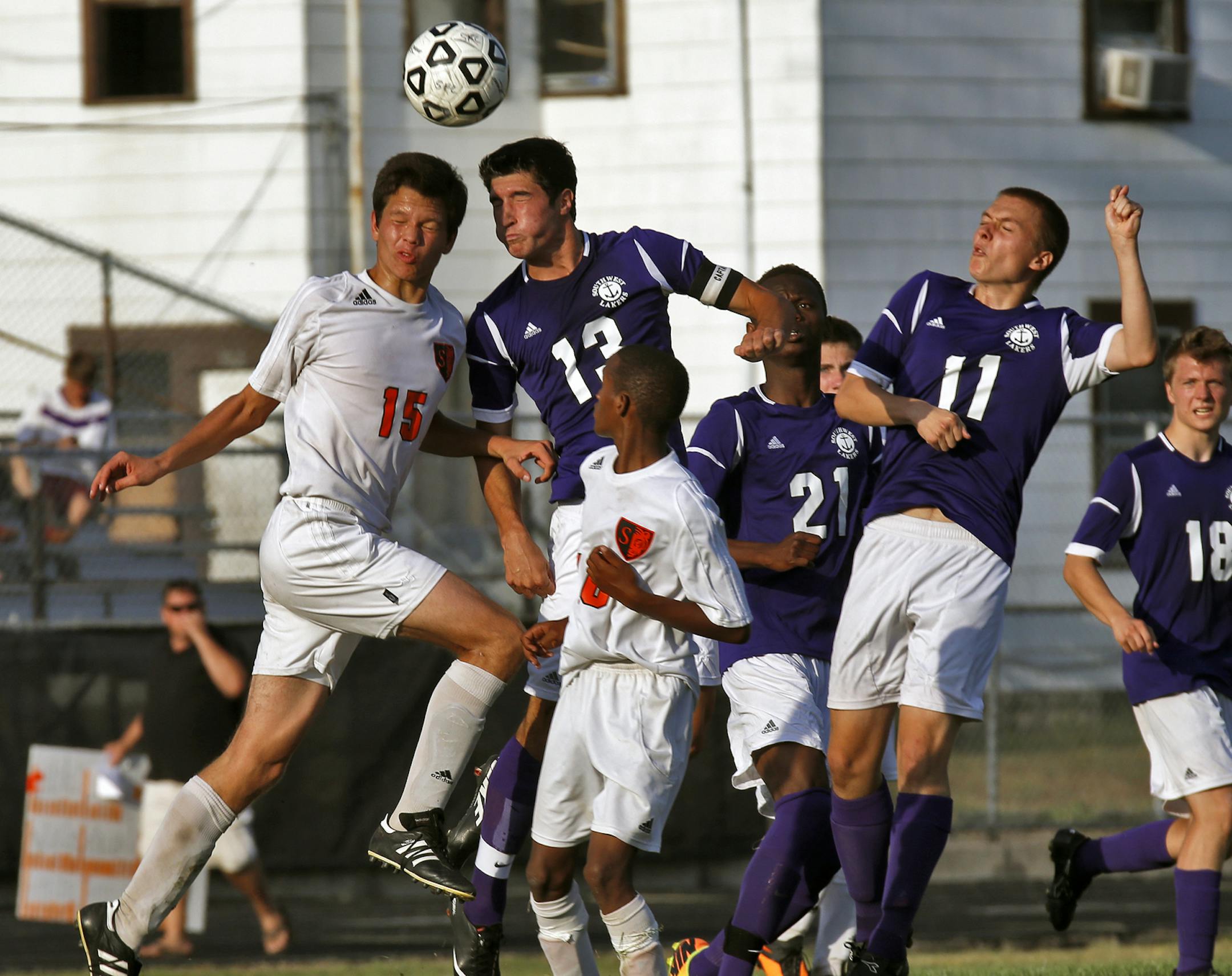 Minneapolis South vs. Minneapolis Southwest soccer game. South's Oscar Campbell (15) and Southwest's Zachary Neiberger (13) headed a goalie kick. (MARLIN LEVISON/STARTRIBUNE(mlevison@startribune.com)