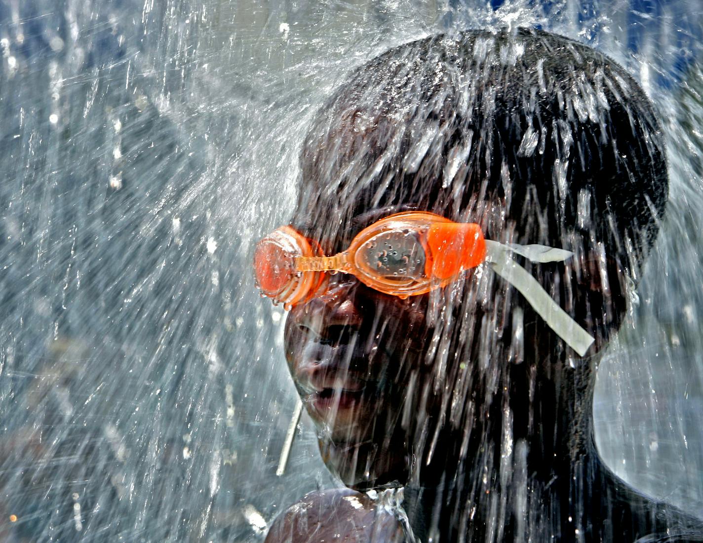 Jerry Holt/Star Tribune 7/10/2005-----Ashanti Hall 11, of Minneapolis cools of from the hot and humid weather North Commons Community center pool. Sundays high was expected to reach 94 degrees with a heat index near 100. GENERAL INFORMATION: Jerry Holt/Star Tribune 7/10/2005-----Ashanti Hall 11, of Minneapolis cools of from the hot and humid weather North Commons Community center pool. Sundays high was expected to reach 94 degrees with a heat index near 100.