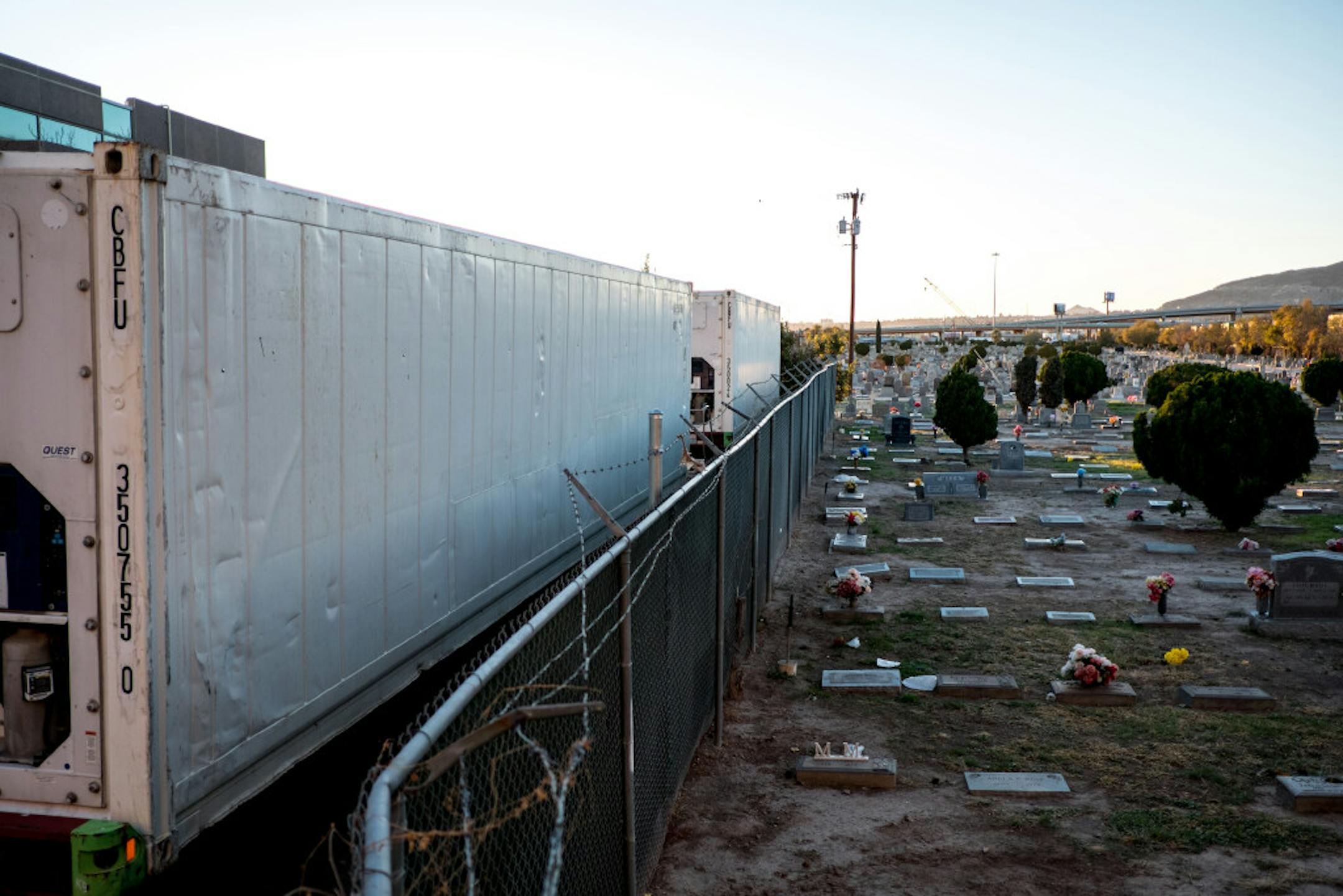 Mobile morgue trailers for COVID-19 deaths are stationed at the El Paso County Office of the Medical Examiner adjacent to the Evergreen Cemetery in El Paso, Texas, this week. El Paso, a border city of 700,000, now has more people hospitalized with COVID-19 than most states and is doubling its supply of mobile morgues, from four to 10, as funeral homes are overwhelmed.