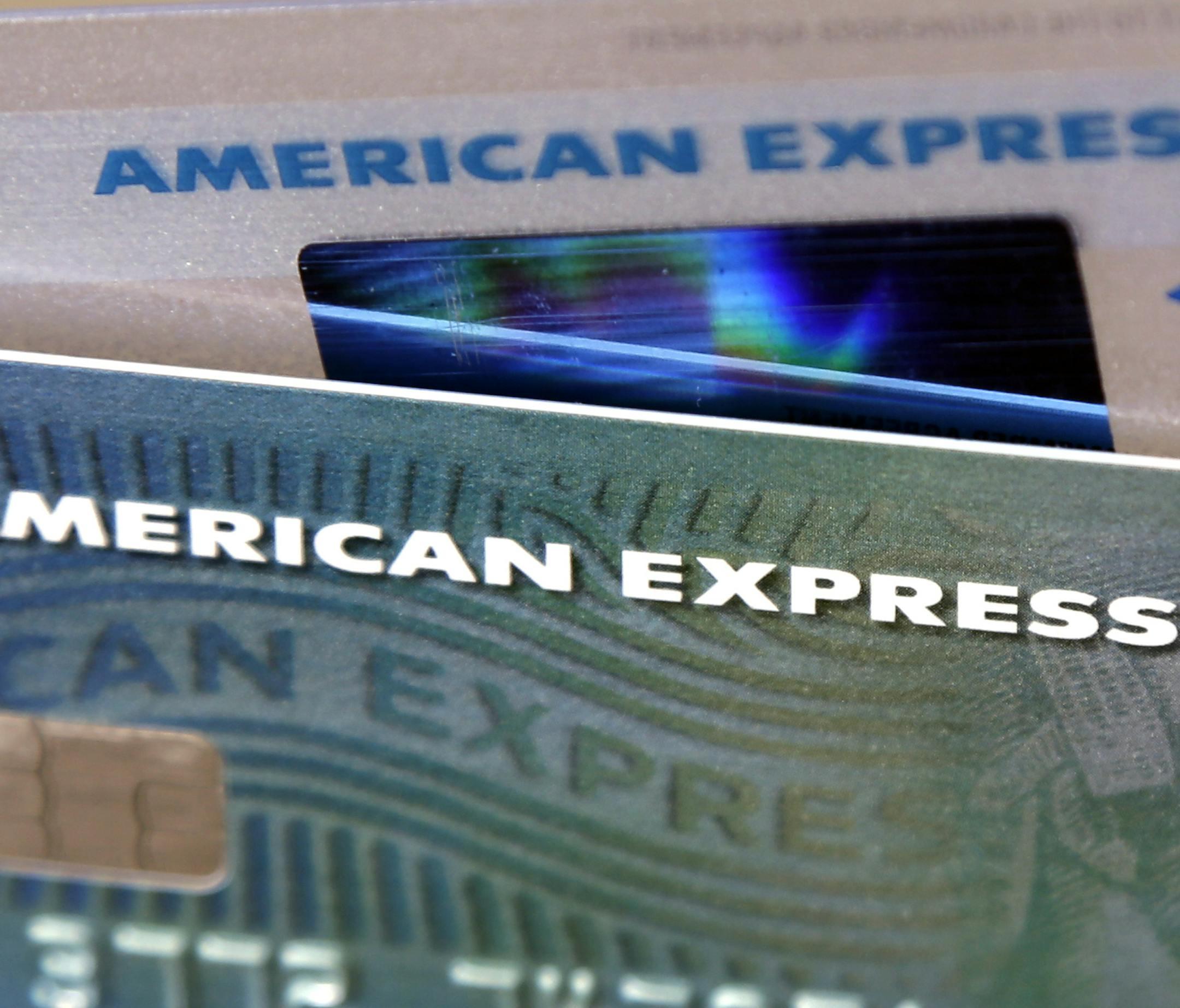 FILE - This Monday, July 18, 2016, file photo shows American Express credit cards, in North Andover, Mass. American Express Co. reports financial results, Wednesday, Oct. 18, 2017. (AP Photo/Elise Amendola, File) ORG XMIT: NYBZ307