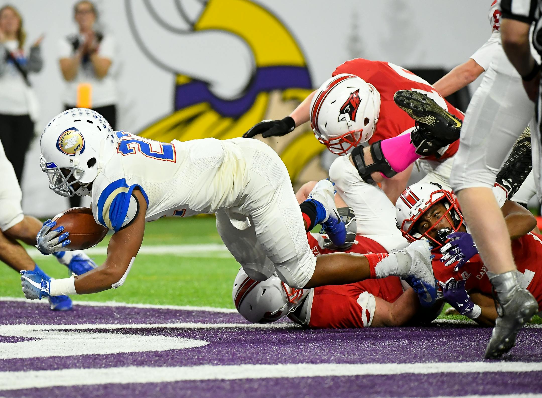 SMB Wolfpack running back Siegel Howard (22) scored a touchdown on his team's opening drive (Aaron Lavinsky, Star Tribune)