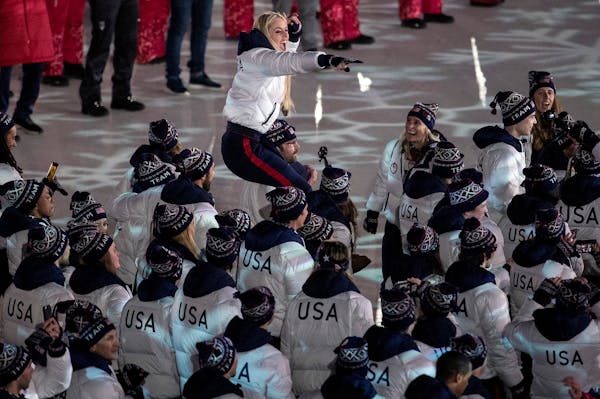 Alpine skier and Minnesota native Lindsey Vonn was carried as Team USA entered Pyeongchang Olympic Stadium during the Closing Ceremony on Sunday.