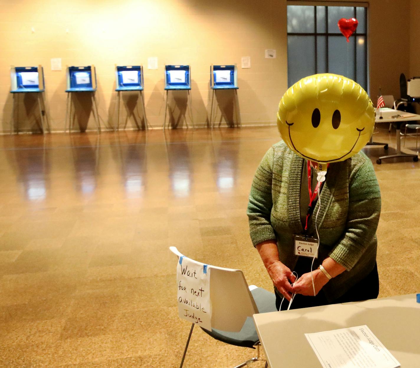 Election judge Carol Johnson tied a balloon to a chair before the polls opened Tuesday, Nov. 5, 2019, at the Arlington Hills Community Center in St. Paul, MN.] DAVID JOLES &#x2022; david.joles@startribune.com Election Day at Arlington Hills Community Center polling place**Chris Yang, cq