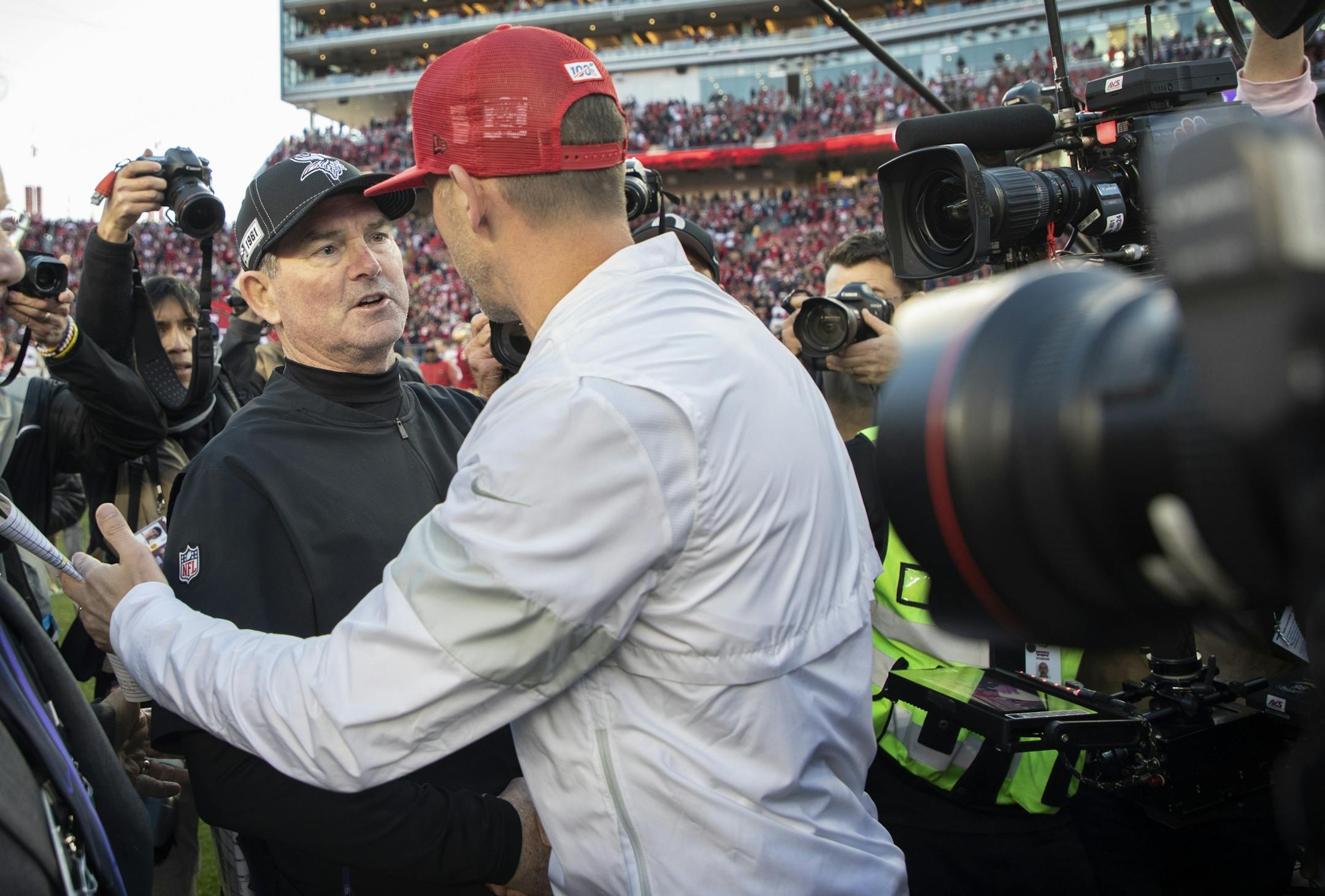 Minnesota Vikings head coach Mike Zimmer congratulated San Francisco 49ers head coach Kyle Shanahan after the game .
