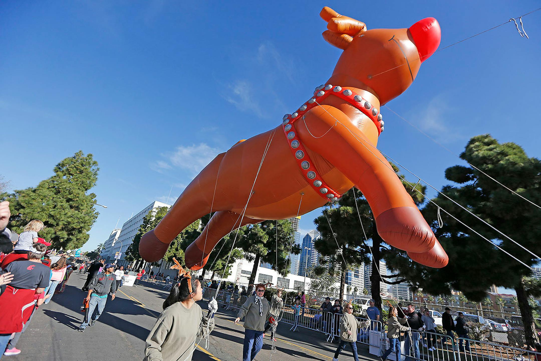 Spectators watched the Port of San Diego Holiday Bowl Parade Tuesday, December 27, 2016 in San Diego, CA. The parade is known to be America's largest balloon parade.