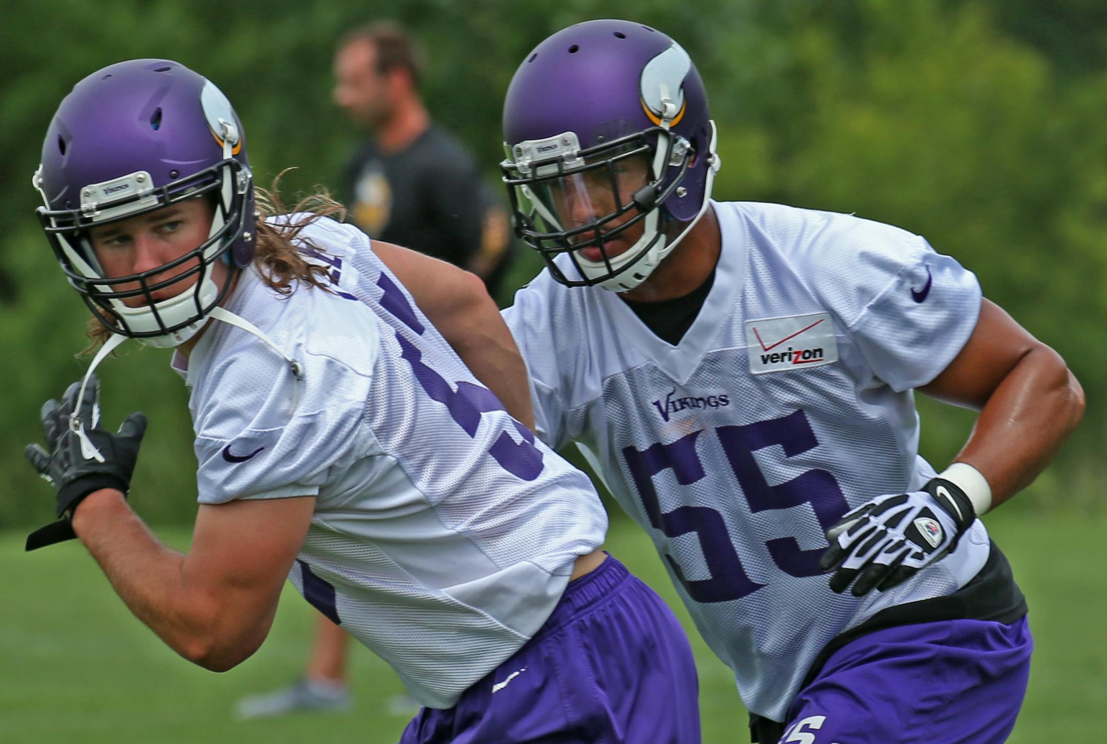 (left to right) Vikings Audie Cole and Anthony Barr ran drills during mini-camp practice at Winter Park on 6/18/14.] Bruce Bisping/Star Tribune bbisping@startribune.com Audie Cole, Anthony Barr/roster.