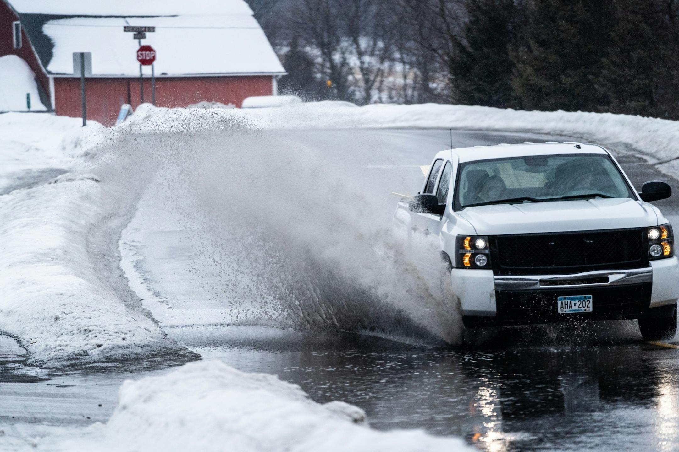 Rain and melting snow made for formidable puddles on roads Saturday in Excelsior.