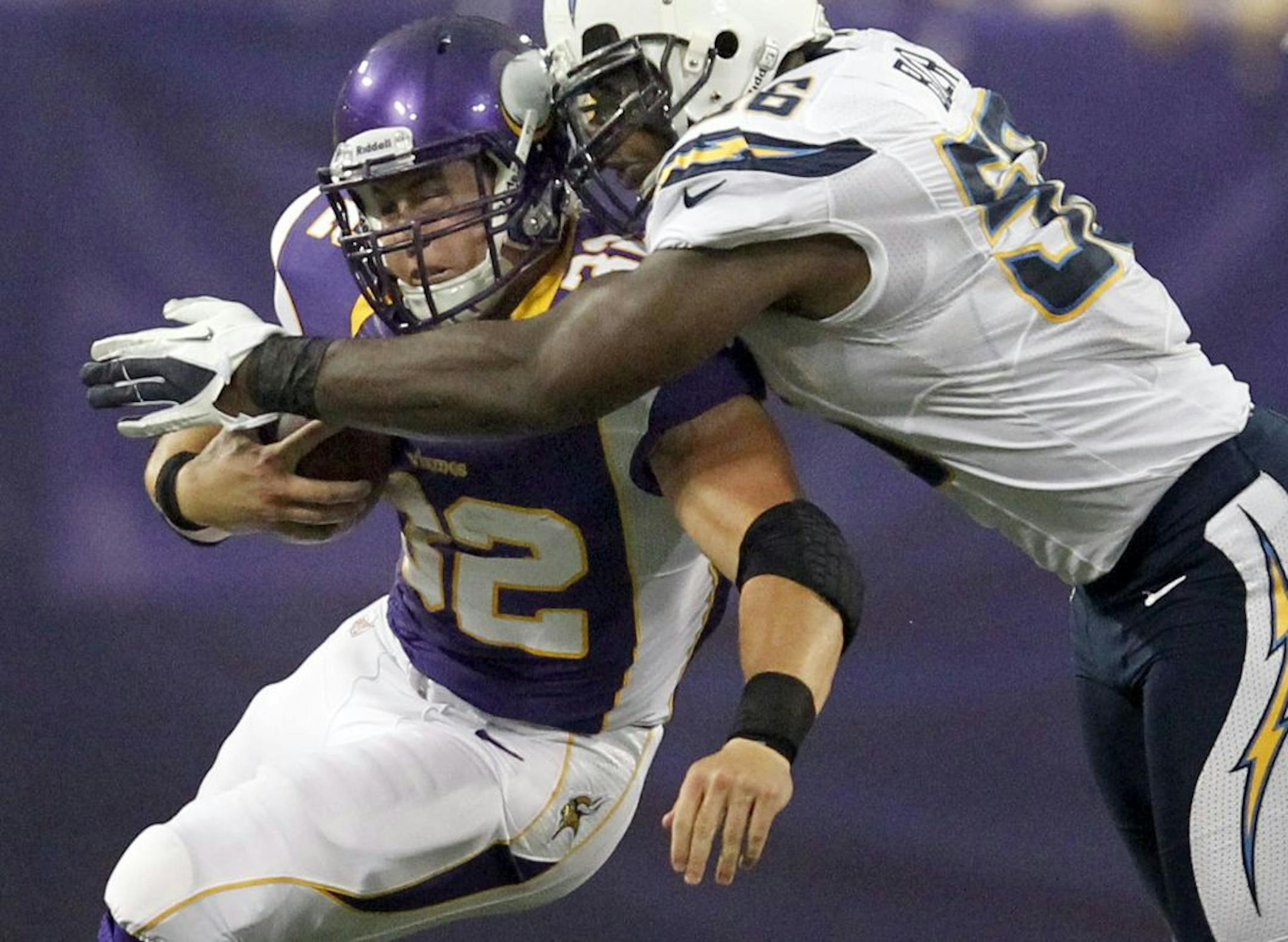 Vikings running back Toby Gerhart was wrapped up by Donald Butler of the Chargers on Friday night.