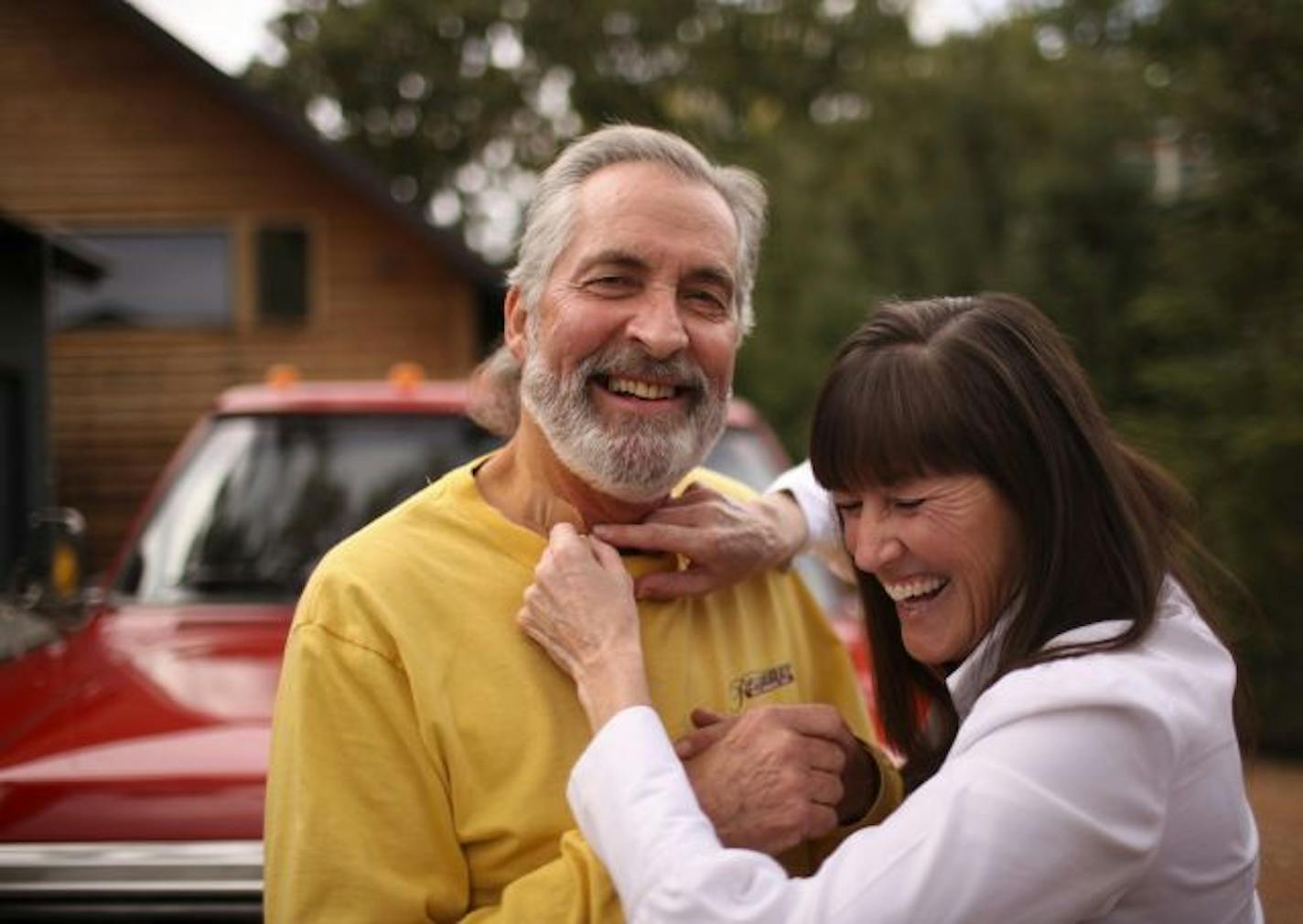 Ron and Shelly Lemmer laugh when Shelly went to remove a bandage covering the spot where a biopsy was taken from his heart earlier in the day. He had a follow-up appointment to monitor his progress post-transplant.