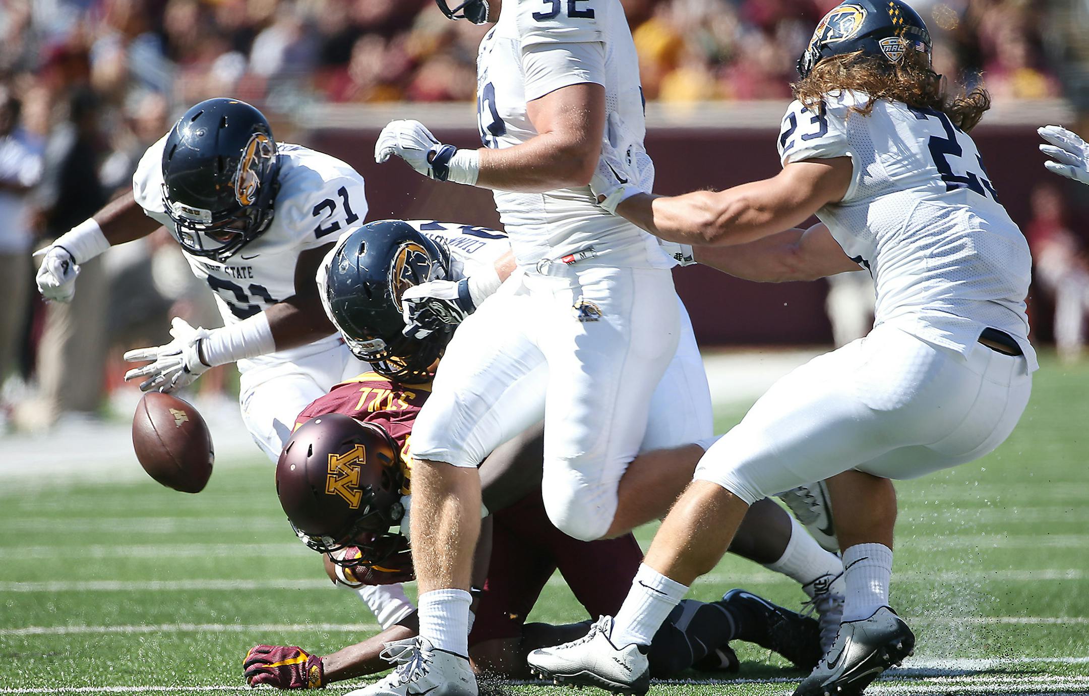 Minnesota's wide receiver Rashad Still fumbled the ball as Kent State cornerback Demetrius Monday recovered it to return the ball for a touchdown in the third quarter as the Gophers took on Kent State at TCF Bank Stadium, Saturday, September 19, 2015 in Minneapolis, MN. ] (ELIZABETH FLORES/STAR TRIBUNE) ELIZABETH FLORES &#x2022; eflores@startribune.com