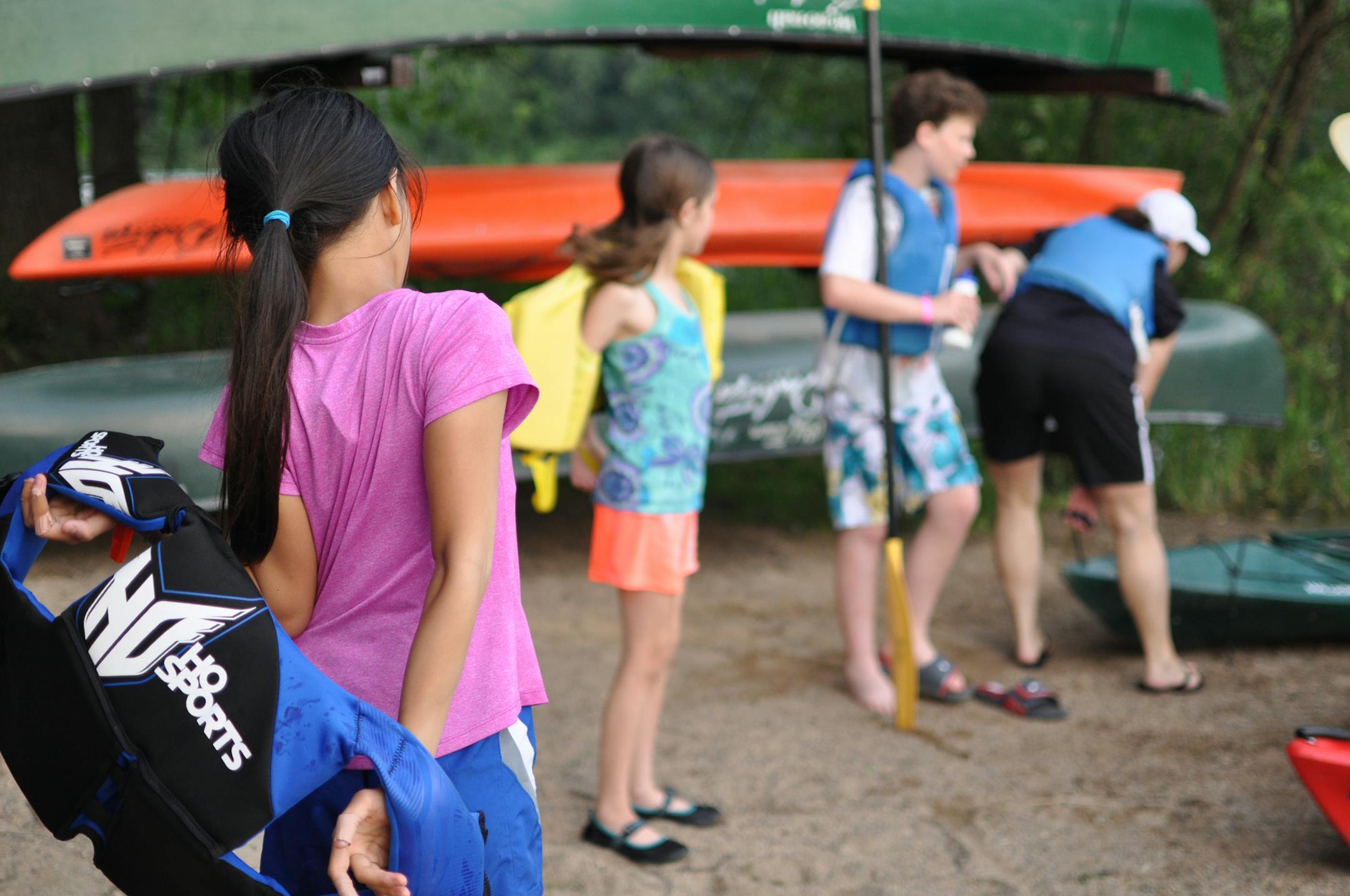Photo by Liz Rolfsmeier Participants got suited up for a parent-child kayak class last week at Lebanon Hills Regional Park.