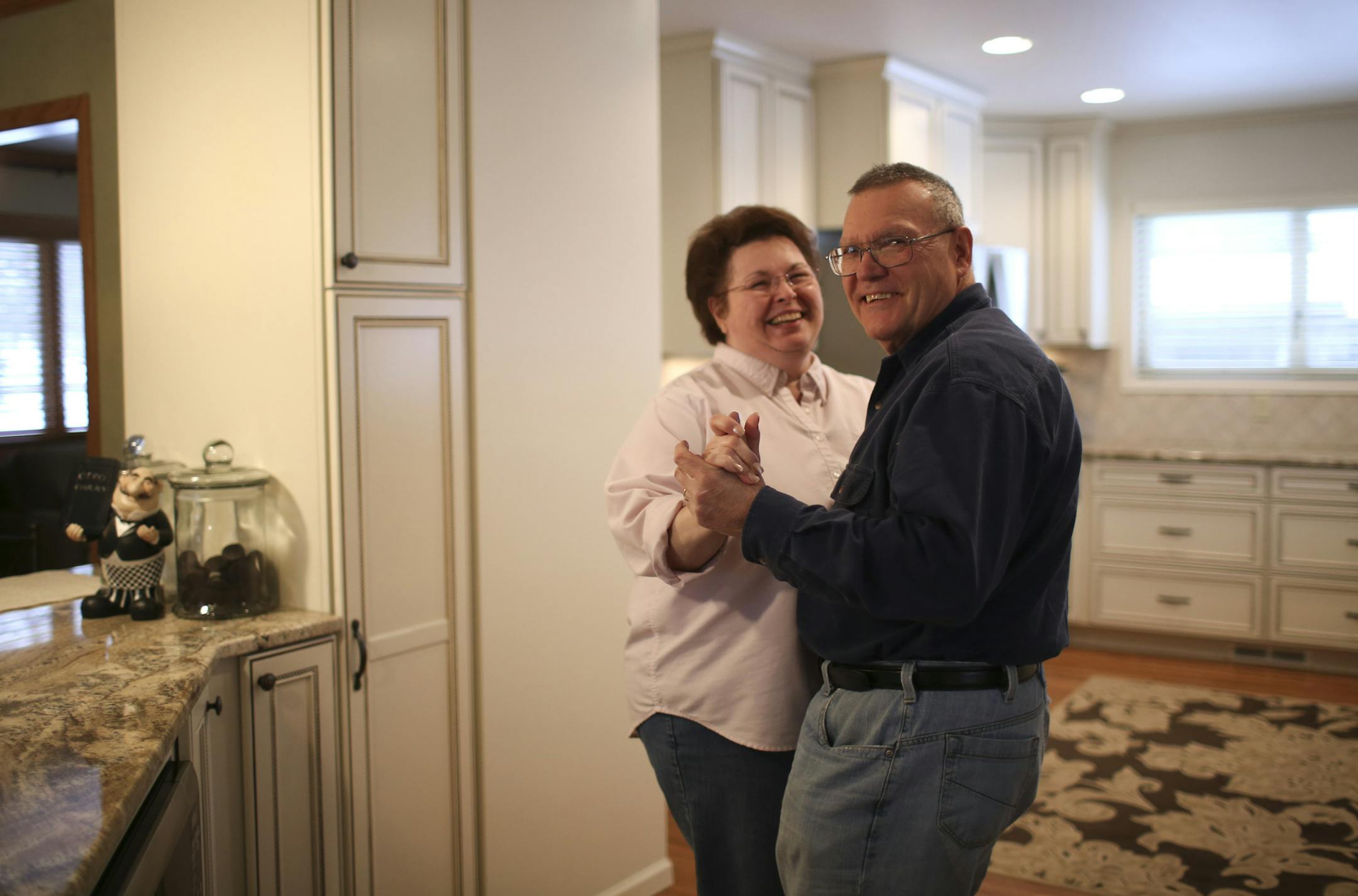 Pat and Gene Swiridow's 1970s rambler remodel and addition will be open for tours on the 2013 Remodelers Showcase, March 22-24. Their kitchen and hearth room addition were photographed Monday afternoon, March 11, 2013 in Eagan, Minn. Pat Swiridow said she and her husband, Gene, like to dance now in their new kitchen. ] JEFF WHEELER ‚Ä¢ jeff.wheeler@startribune.com