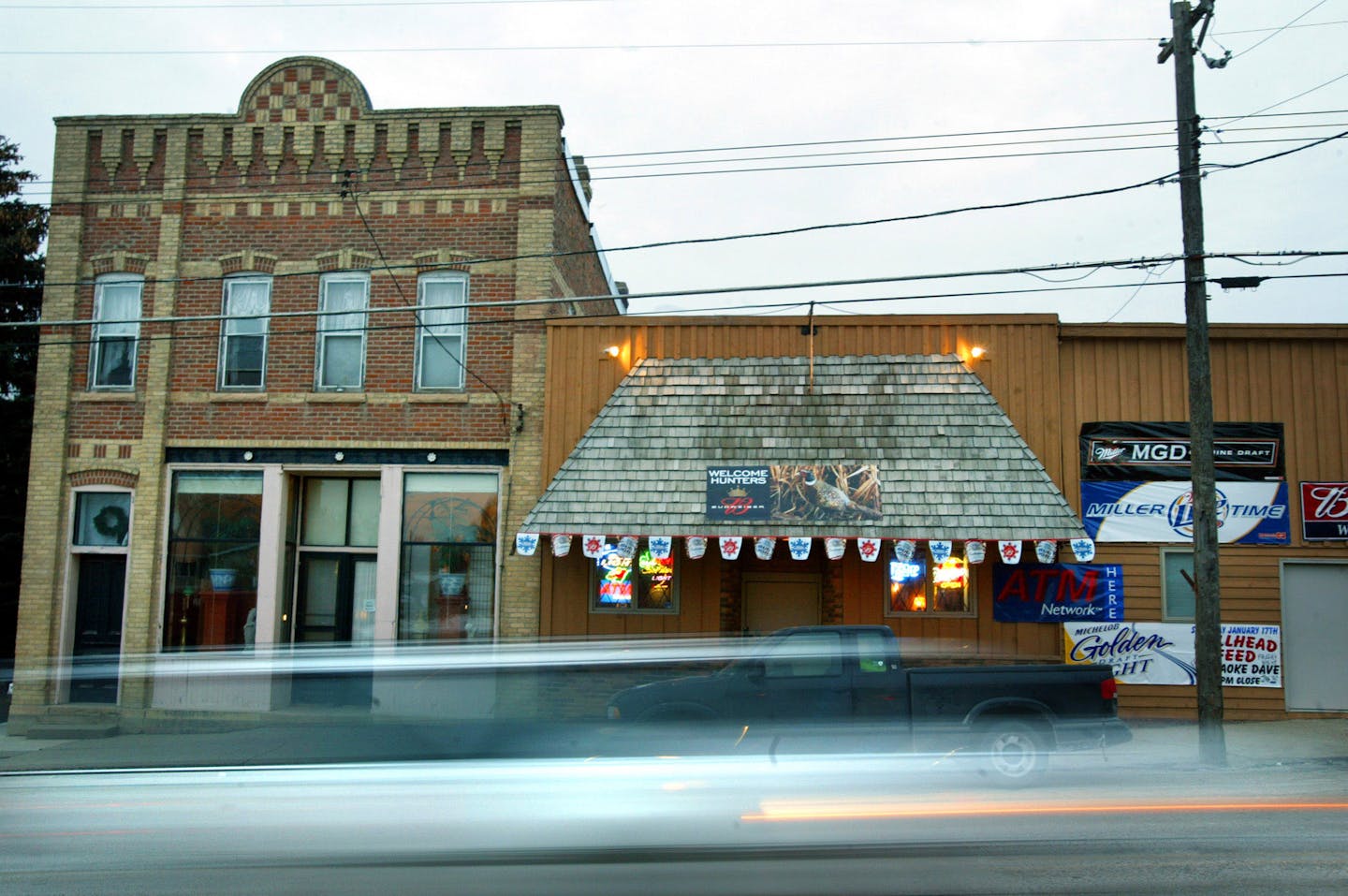 A car speeds past downtown New Market on County Road 2. New Market residents worry about the increased traffic through their small town due to a large increase in housing developments and commuters in the area. County Road 2 runs through downtown New Market at 30 MPH, yet pedestrians have to be extra observant of speeding drivers heading west over a hill as they come into town. Stribsouth