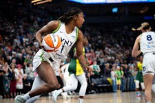 Lynx forward Diamond Miller (1) takes the ball back toward the basket during the home opener against Storm at Target Center on Friday.