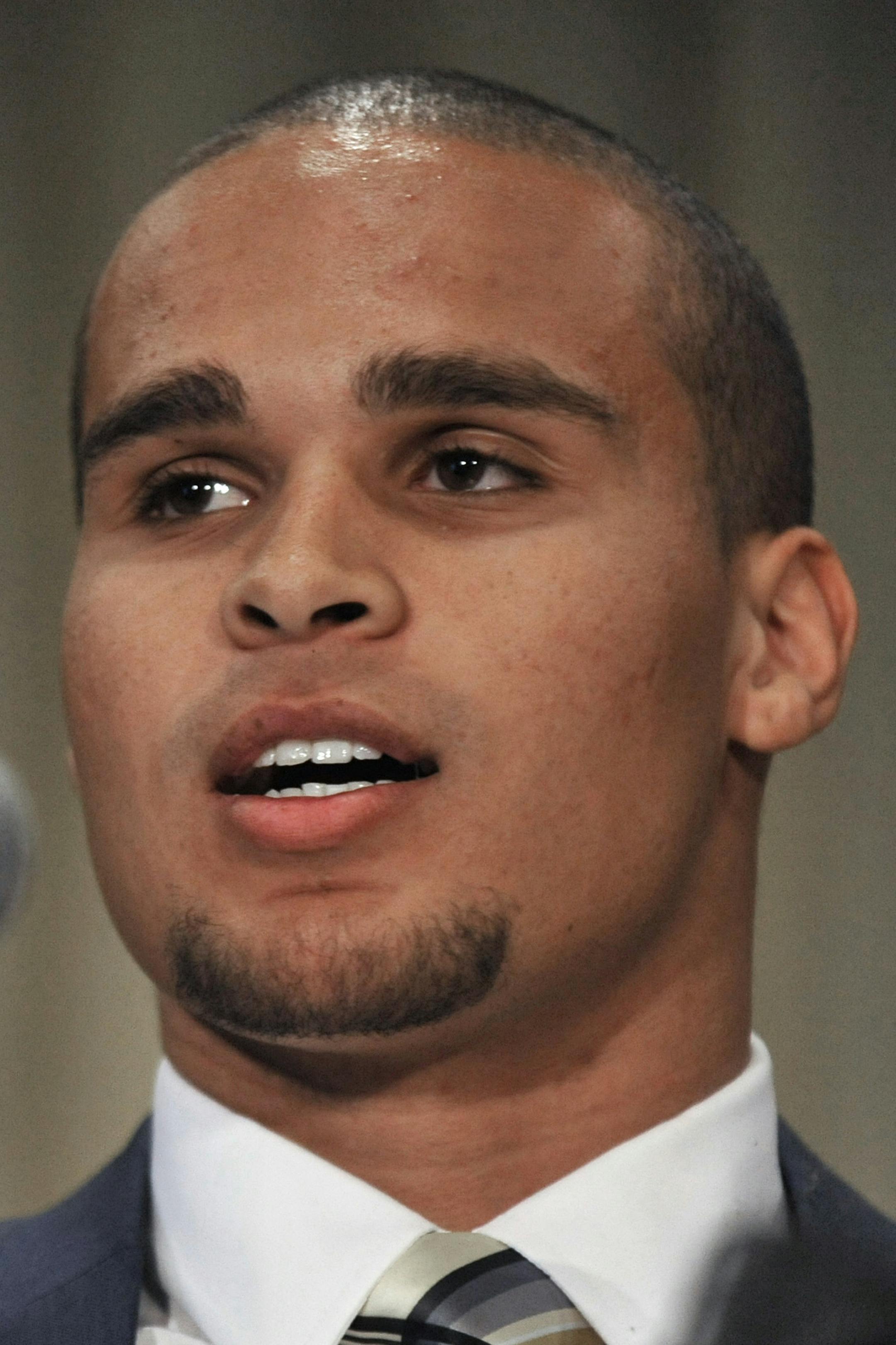 CORRECTS SPELLING TO COLTER, INSTEAD OF COULTER - Northwestern quarterback Kain Colter speaks during a news conference in Chicago, Tuesday, Jan., 28, 2014. Calling the NCAA a "dictatorship," a handful of Northwestern football players announced Tuesday they are forming the first labor union for college athletes, the College Athletes Players Association. (AP Photo/Paul Beaty)