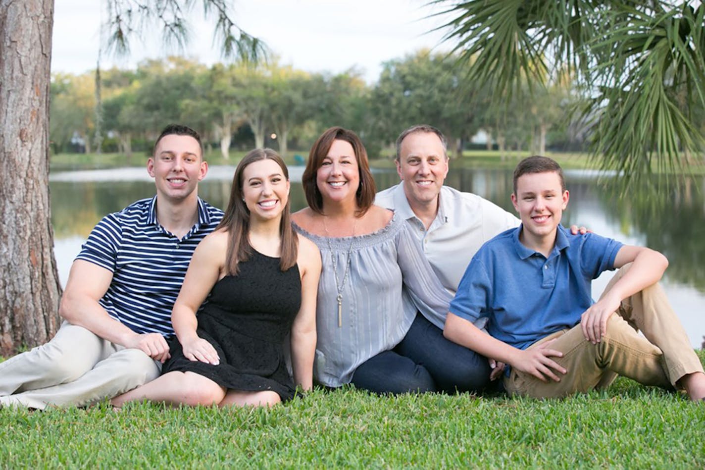 Dr. Robin Hauser, middle, a pediatrician in Tampa, Fla., got COVID-19 in February, seven weeks after receiving her second dose of vaccine. Daughter Molly and son Brady, right, live at home and also got COVID-19, while husband Brian and son Jacob, left, did not. (Carrie Wildes Photography/Kaiser Health News/TNS) ORG XMIT: 14753305W