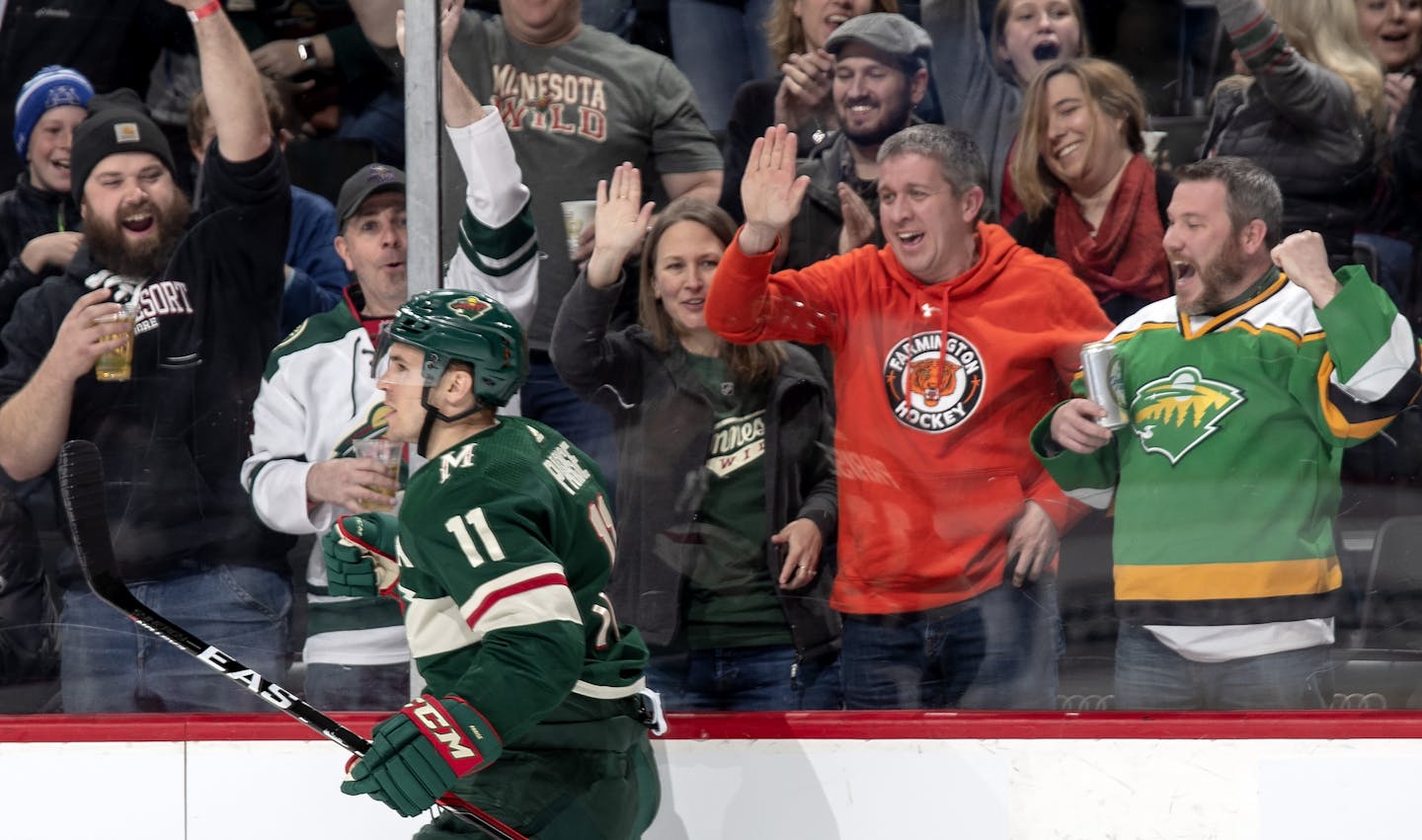 Fans celebrated after Zach Parise scored his second goal of the first period. But things turned bleak later when players and fans saw the Wild was eliminated from the playoff chase.