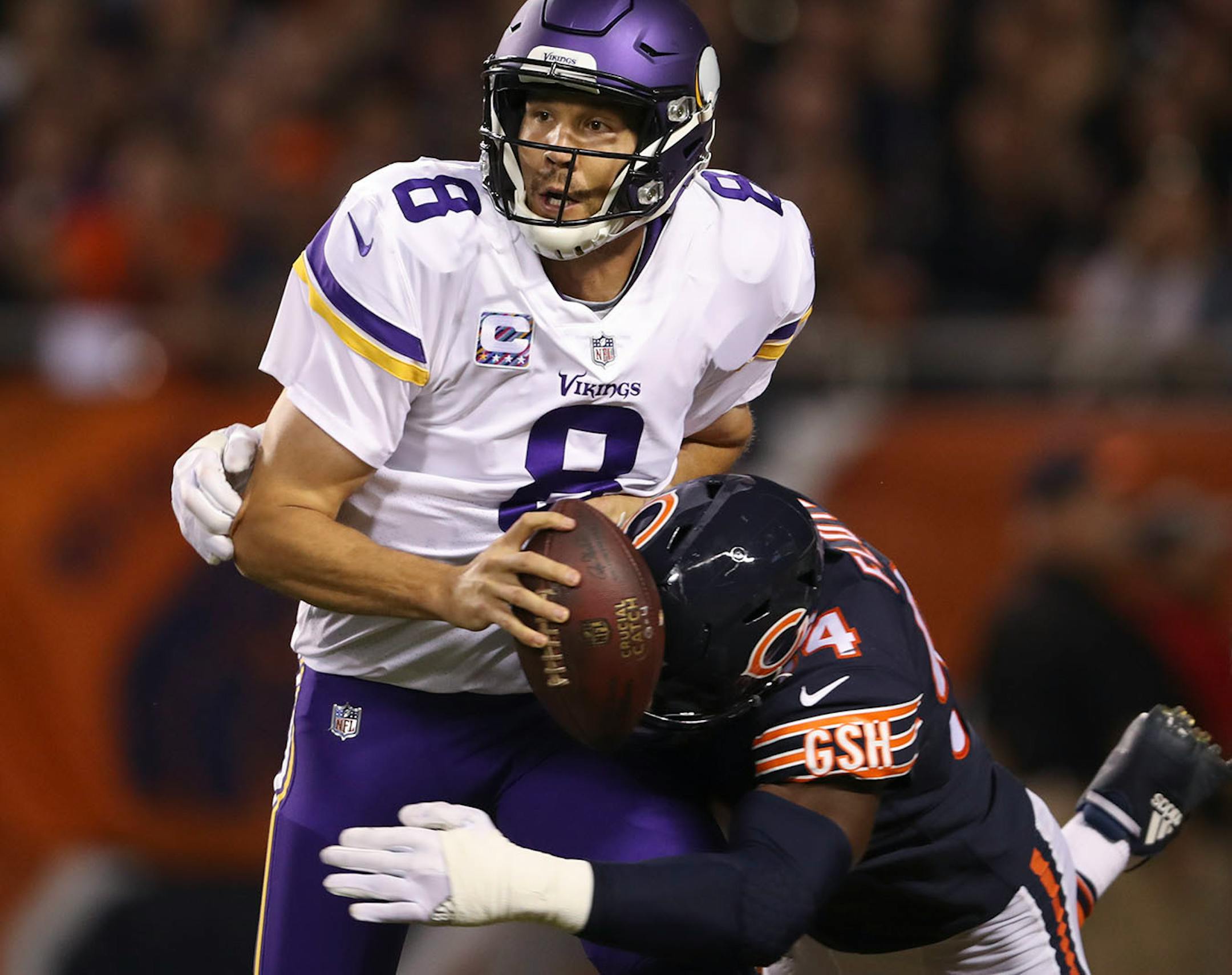 Minnesota Vikings quarterback Sam Bradford (8) was sacked in the end zone by Chicago Bears outside linebacker Leonard Floyd (94) for a safety in the first quarter.