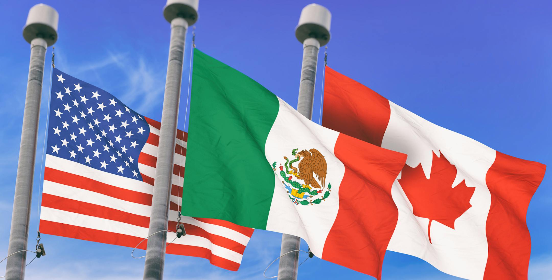Canada, Mexico and US Flags over blue sky, conceptual image for Nafta agreement (3D rendered image)