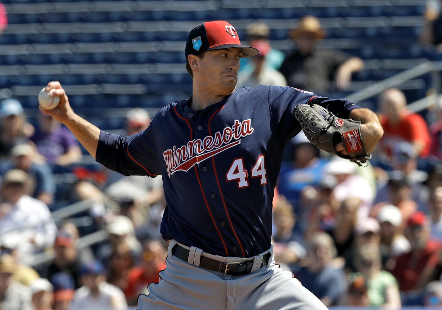 Kyle Gibson delivers a pitch against Philadelphia during a spring training game earlier this month.