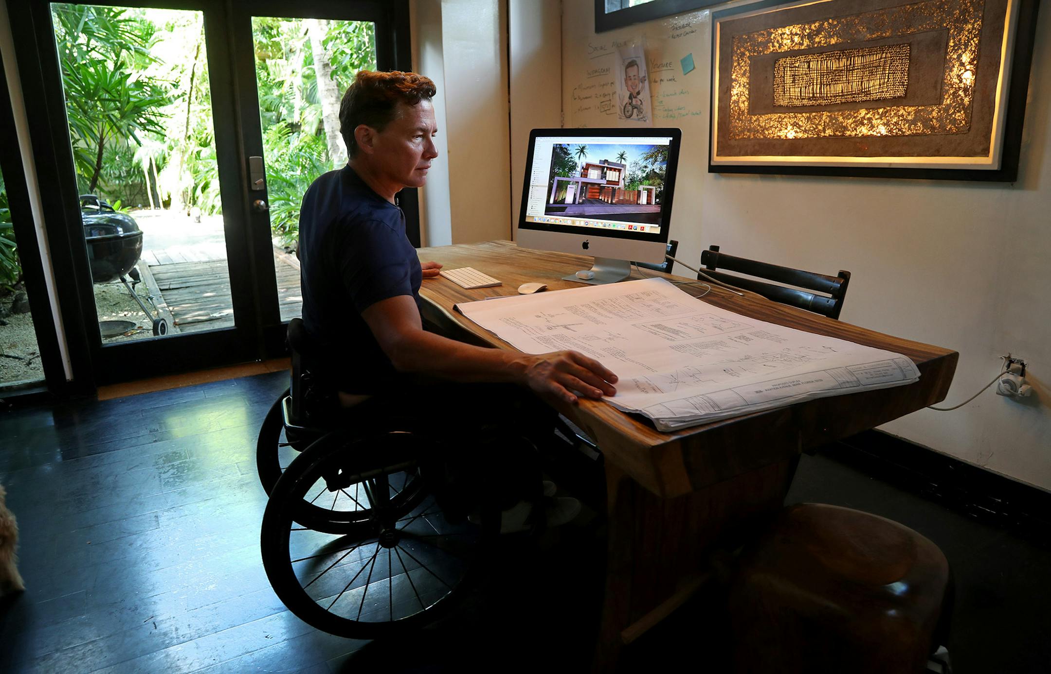 Master Chef Latino John Pardo in his home office in Coconut Grove. For the designer and entrepreneur, participating in MasterChef Latino was only the first "dish" of Pardo's extensive menu of surprises. (Susan Stocker/South Florida Sun Sentinel/TNS) ORG XMIT: 1396524 ORG XMIT: MIN1908200337540399