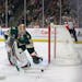 Minnesota Wild goaltender Filip Gustavsson (32) stops the puck during the second period of an NHL hockey game against the Chicago Blackhawks, Saturday
