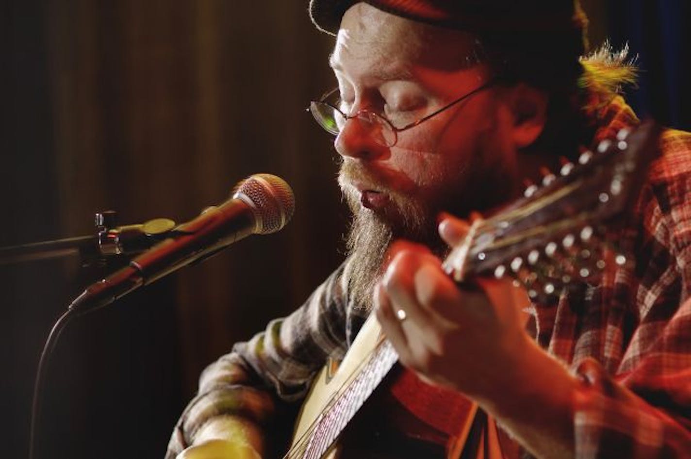 David Brewster / StarTribune Sunday_10/09/05_Mpls - - - - - - Charlie Parr playing at the Kitty Kat Klub in Dinkytown. Duluth's acoustic blues/folk picker Charlie Parr might be the most admired new musician in Minnesota, earning praise from oldies like Dave Hull and John Koerner and younger fans like members of Low and Trampled by Turtles. A former social worker with homeless, he plays the blues with a rare authenticity.