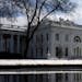 The White House is reflected in a puddle from the melting snow on Thursday, February 21, 2019 in Washington, D.C. (Olivier Douliery/Abaca Press/TNS)