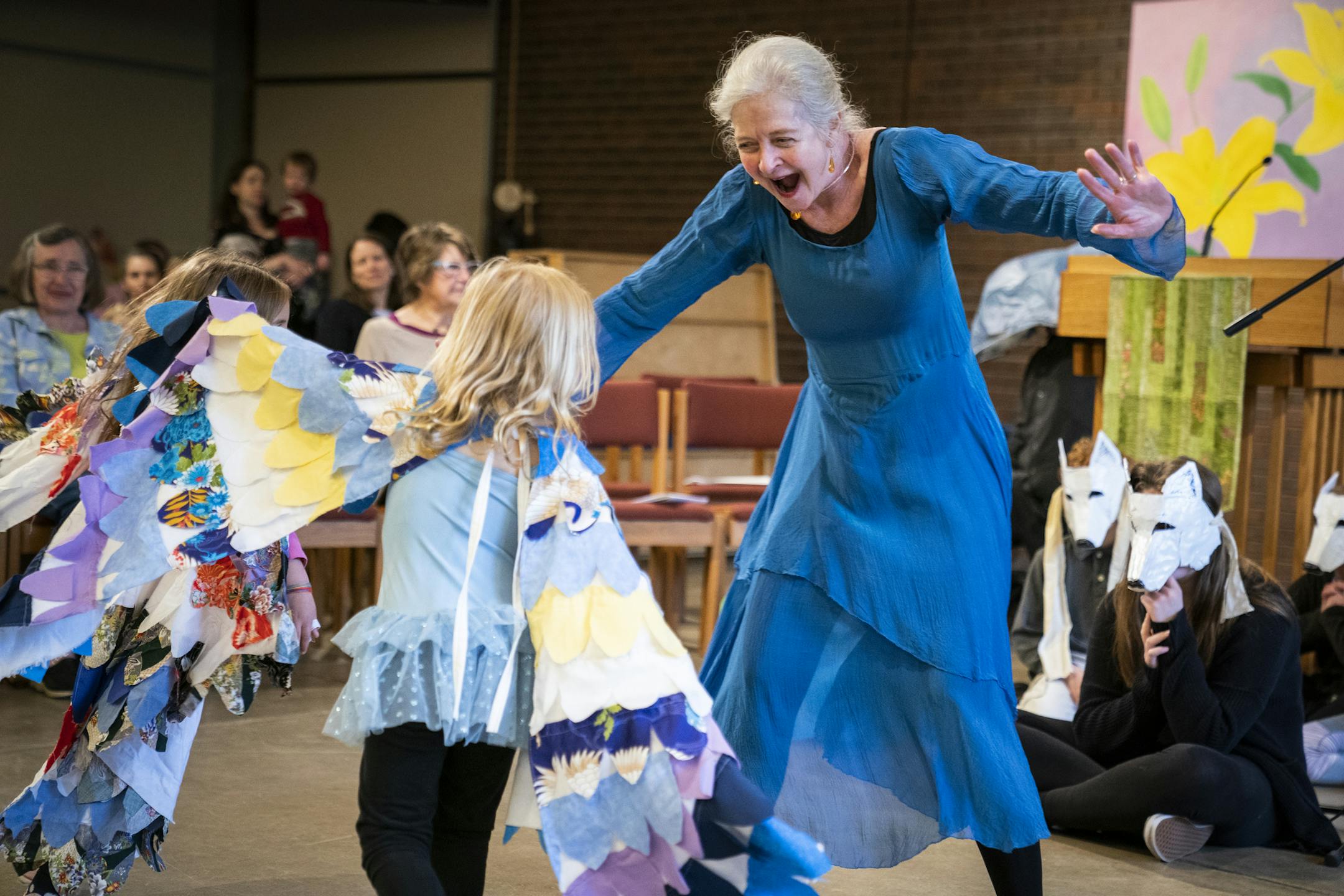 Tammy Rogers leads the bird dancers during the Missa Gaia Earth Mass.