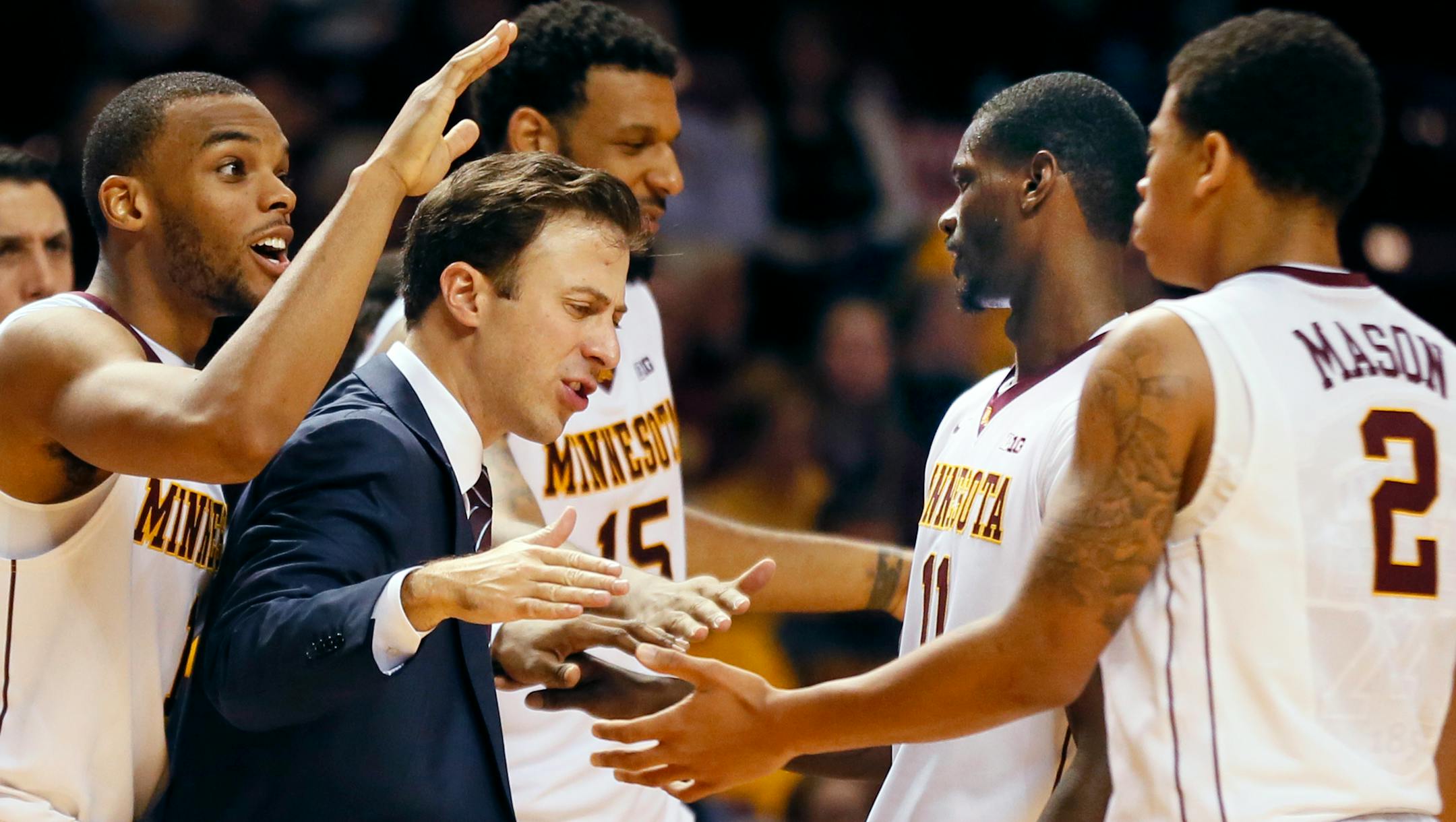 Minnesota Gophers coach Richard Pitino talked with his team during a game against Western Kentucky on November 18, 2014.