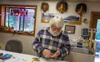 ADVANCE FOR WEEKEND EDITIONS, JULY 24-26 In this July 3, 2015, photo, Hyder General Store owner Wes Loe counts loonies, Canadian one dollar coins, in 