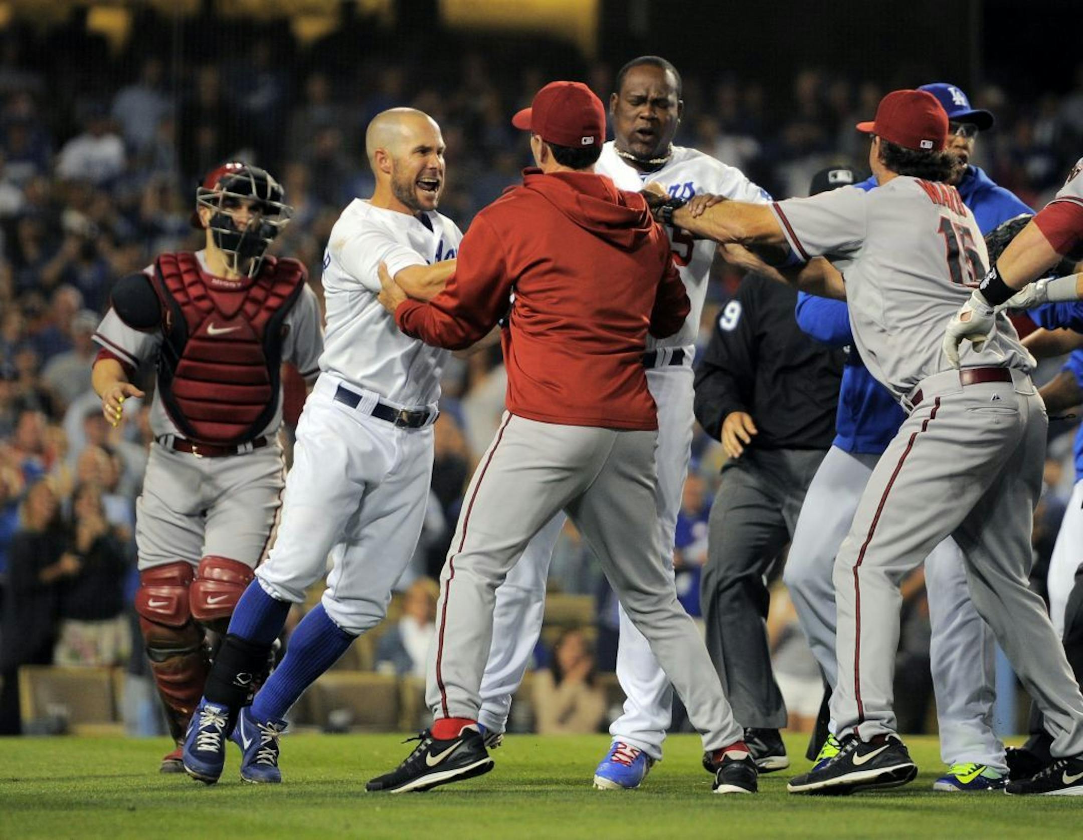 A scuffle breaks out after Los Angeles Dodgers starting pitcher Zack Greinke was hit by a pitch during the seventh inning of their baseball game against the Arizona Diamondbacks, Tuesday, June 11, 2013, in Los Angeles.