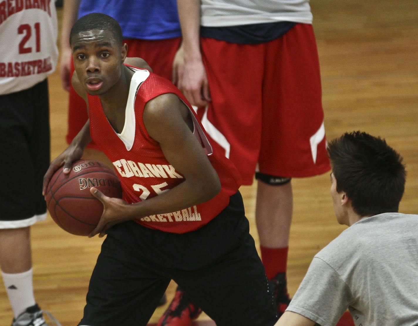 Marcellous Hazzard looked to pass during practice at Minnehaha Academy on Monday, March 18, 2013, in Minneapolis, Minn. ] (RENEE JONES SCHNEIDER * reneejones@startribune.com)