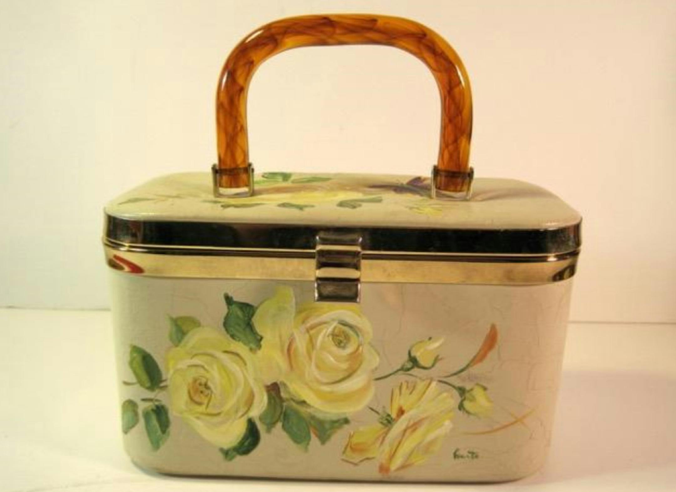 Roses seem to bloom on this vintage Lily-Bet bag. (Handout/TNS) ORG XMIT: 1234072