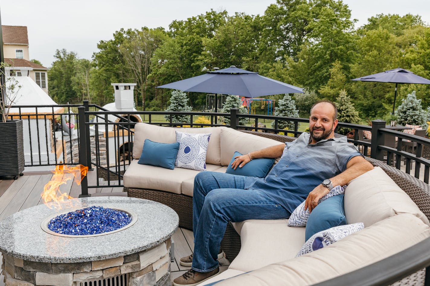 Bill Paliouras on a newly renovated dream deck at his Branchburg, N.J., home. MUST CREDIT: Photo for The Washington Post by Melanie Landsman