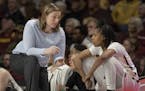 Gophers coach Lindsay Whalen spoke with Kenisha Bell during a game at Williams Arena last month.