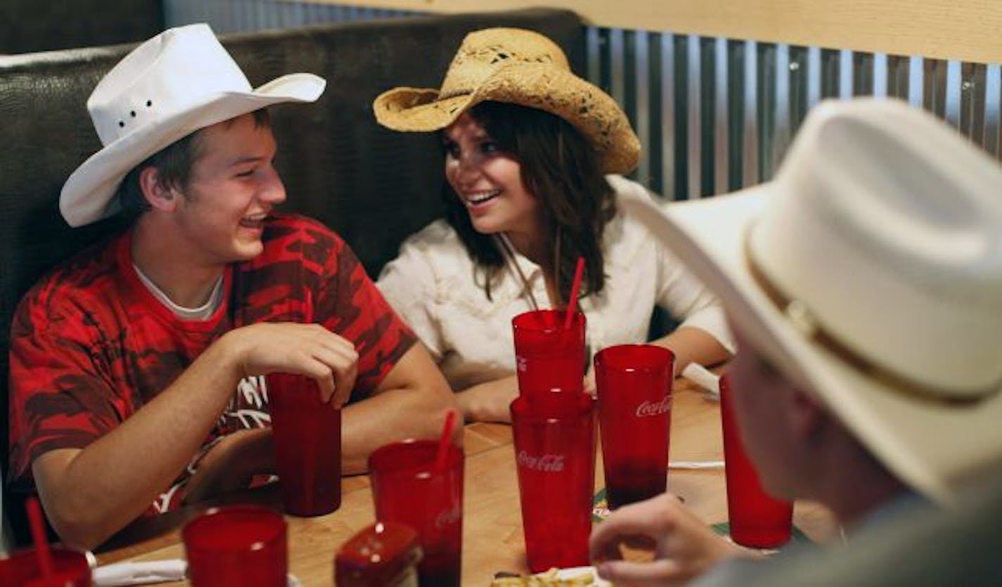 Michael Wolf and Callista Carlson enjoyed drinks at Toby Keith's I Love This Bar & Grill in St. Louis Park.