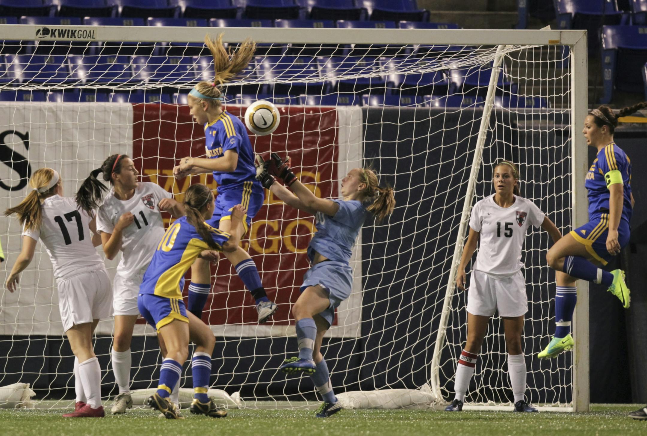 Lakeville North goalie Alexis Joyce reached for the save