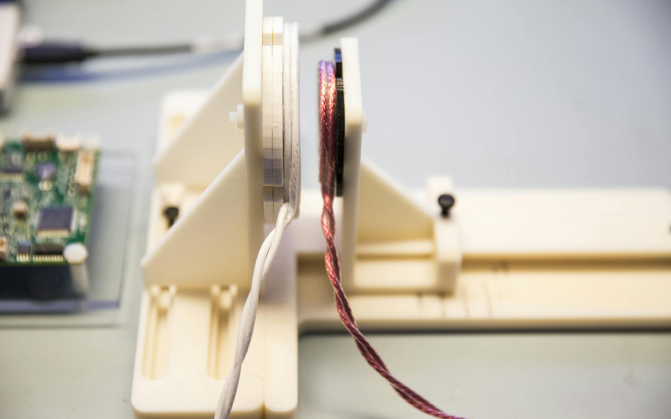 The TETS (Transcutaneous Energy Transmission System), a wireless power transfer system used to run medical devices, is run through tests at Minnetronix in St. Paul on Wednesday, August 5, 2015. ] LEILA NAVIDI leila.navidi@startribune.com / BACKGROUND INFORMATION: Minnetronix is marketing a new technology that allows the batteries in implantable medical devices to be recharged wirelessly. The technology works by transmitting energy through the skin to the device, without needing to break the skin