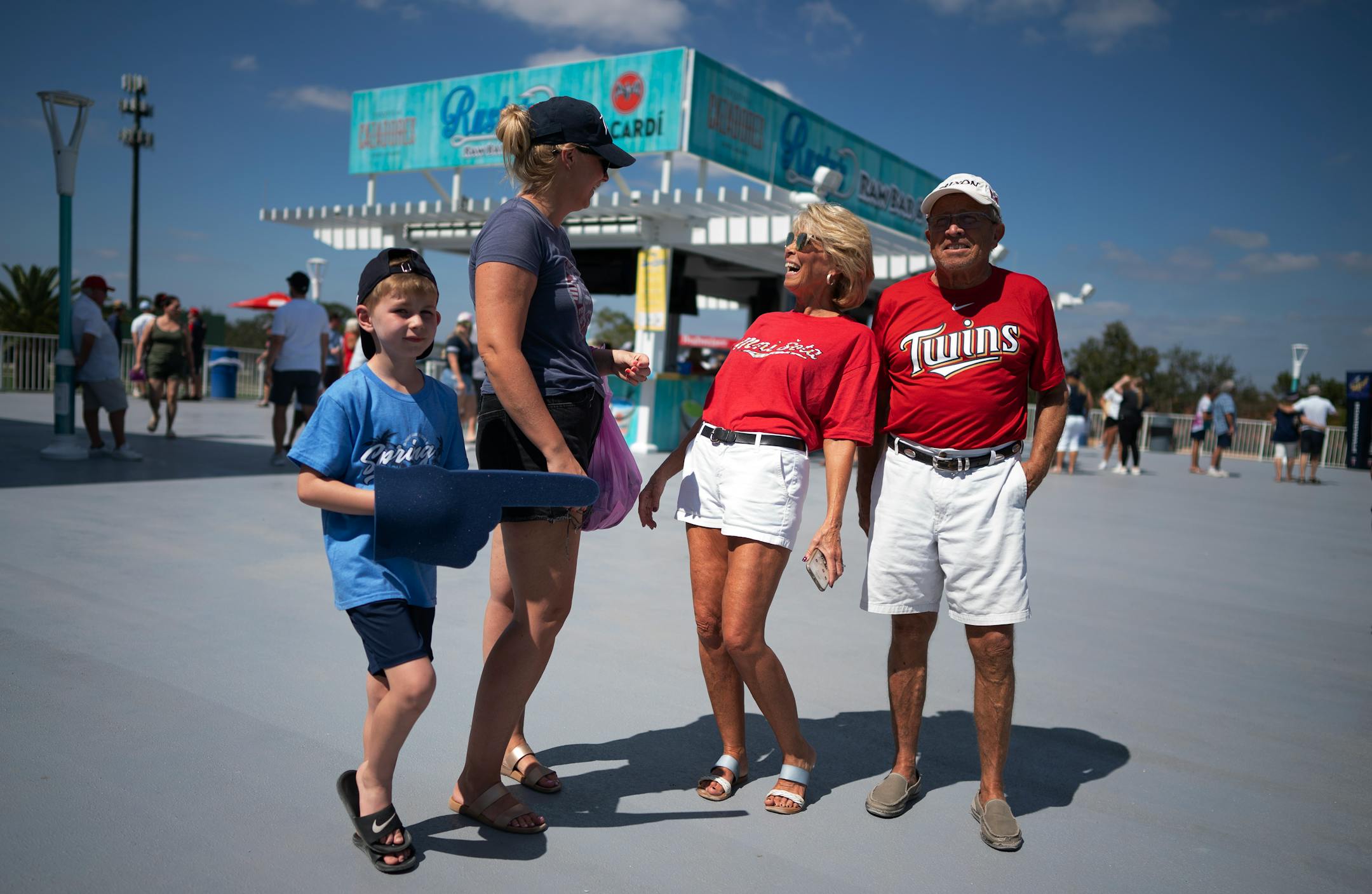 Landon Degree, 7 and his mom Kristi Degree, residents of theTwin Cities enjoyed the hot sunny weather with her parents Joyce and Craig Sunderg at Hammond Stadium. Kristi changed her flight in time to fly out last Tuesday from Minneapolis to join her parents who winter in Fort Myers. On Kristi's flight out to Fort Myers, the pilot said "Let's get you out of the storm," according to Kristi.