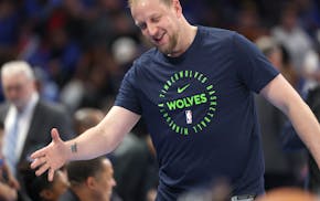 The Timberwolves' Joe Ingles hands out greetings before the Timberwolves played Oklahoma City on Thursday at Paycom Center.