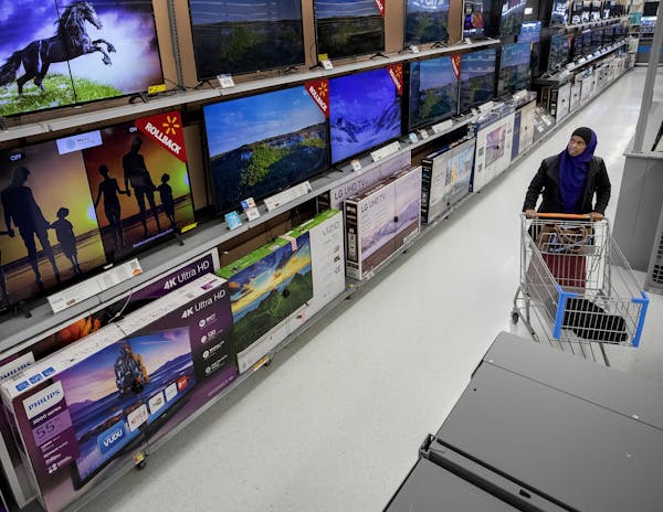 Sales ads for the Friday after Thanksgiving continue to highlight TVs, such as these on display at Walmart in Fridley.